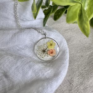 Silver Round Necklace With Yellow, Orange And White Flowers