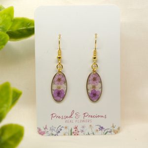 Gold Oval Earrings With A Trio Of Purple And White Flowers
