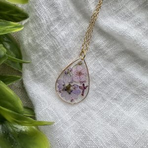 Large Gold Teardrop Necklace With Various Purple Flowers