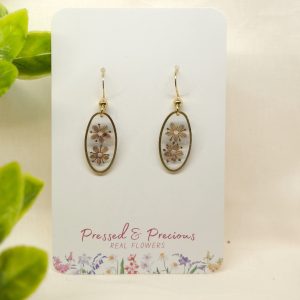 Gold Oval Earrings With Brown And White Flowers